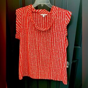 Cabi reddish orange sleeveless top.